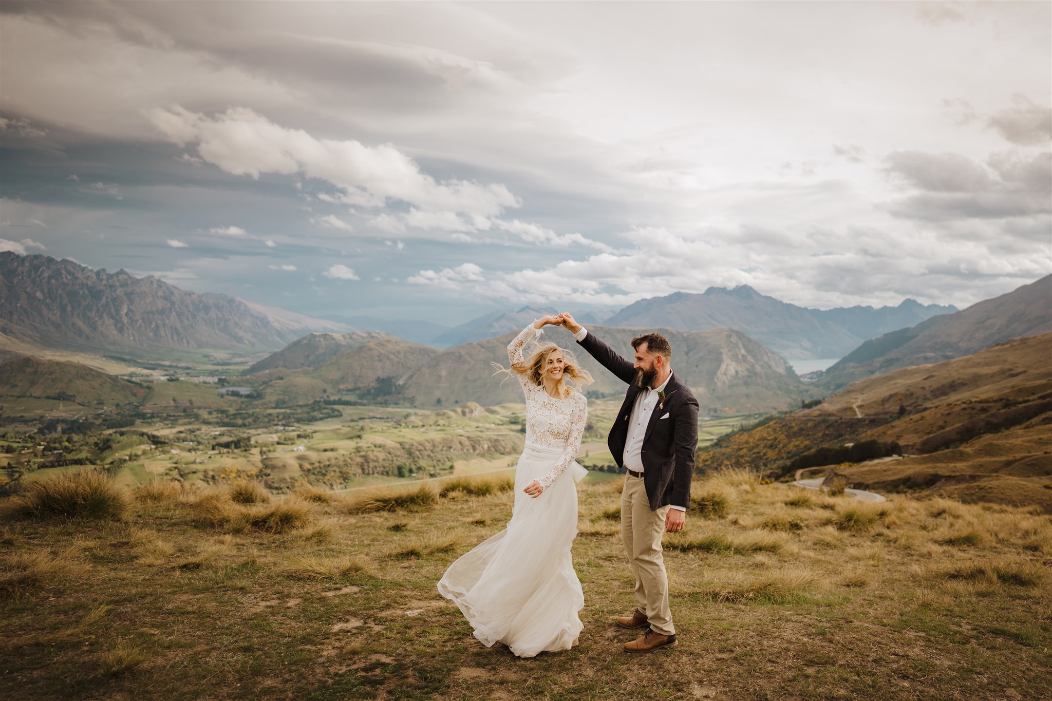 Bride and groom dancing at Coronet Peak in Queenstown New Zealand