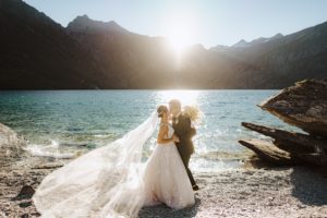 bride and groom kiss at sunset at Lochnagar in Queenstown New Zealand