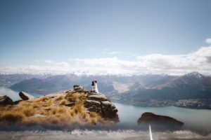 Bride and groom on top of a mountain in Queenstown New Zealand